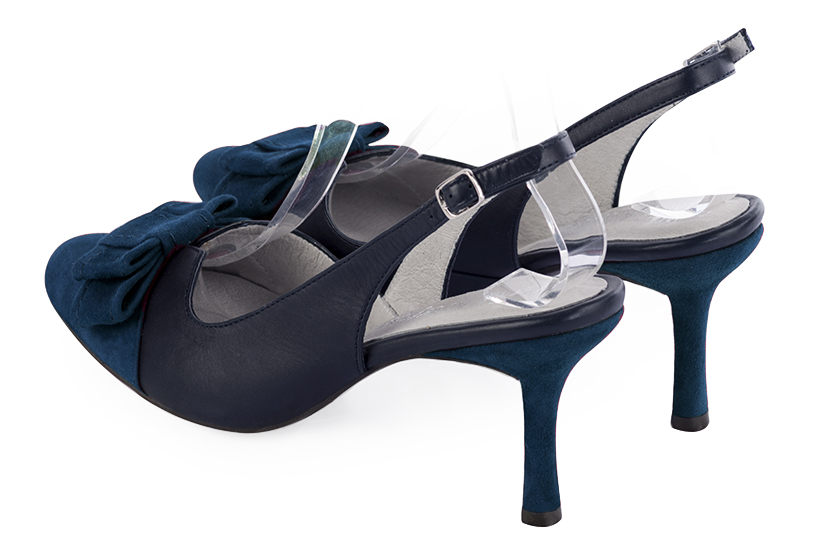 Navy blue women's open back shoes, with a knot. Round toe. High slim heel. Rear view - Florence KOOIJMAN